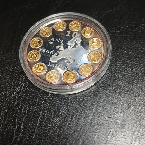 Europe 10 Years Commemorative Medal, silver with gold details