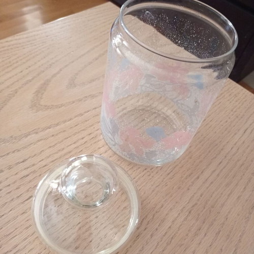 Glass kitchen jars like new, 1 small and 1 large