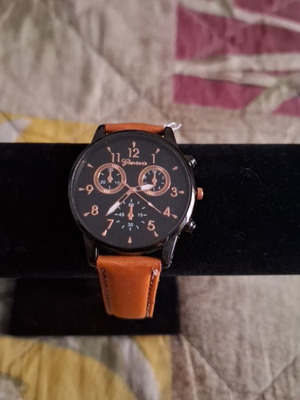 Wristwatch new with leather strap and 40mm diameter