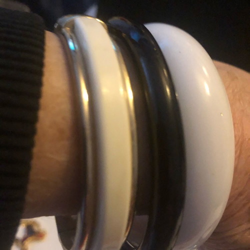Bracelets like new, set of 4, white, black, cream with gold and Indian design