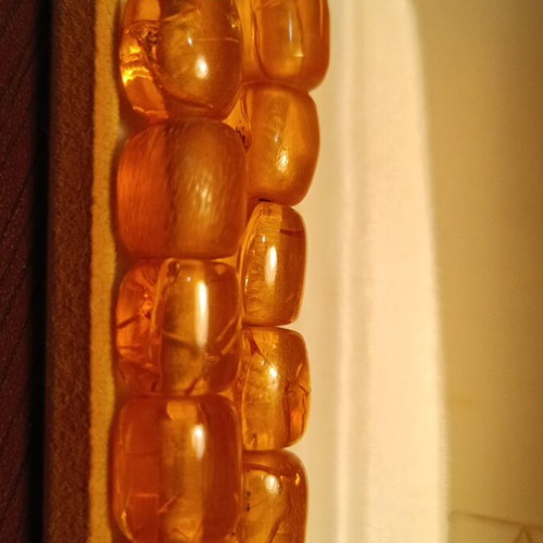 Handmade komboloi with amber-colored incense beads and silver finish, new
