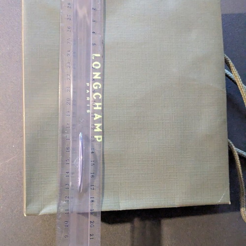 Longchamp paper bag like new, approx. 19x18 cm