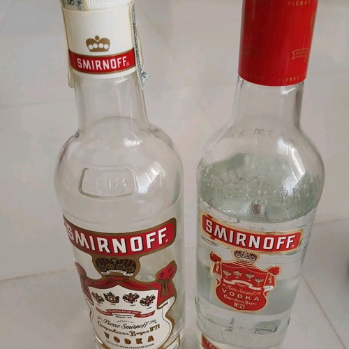 Pack of 2 old drinks, 1 vodka and 1 Bacardi, like new