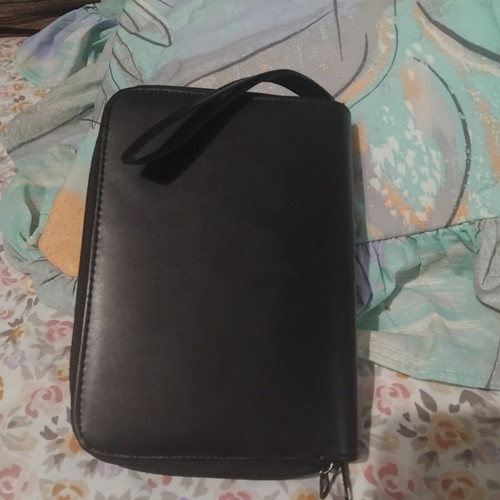 Organizer agenda with zipper used, black color, internal dividers