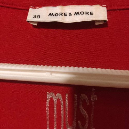 More red elastic blouse with long sleeves and deep neckline new