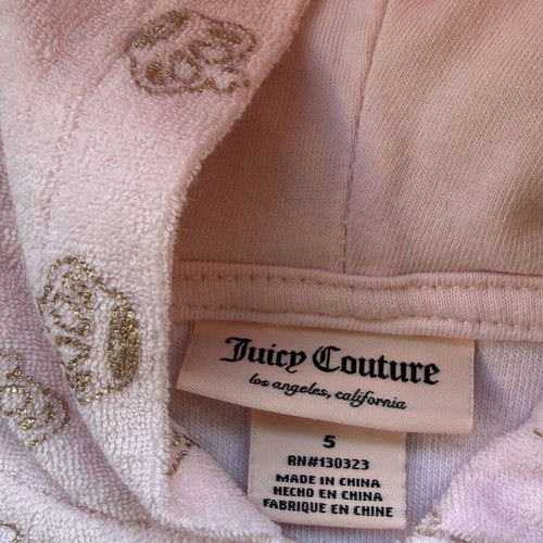 Juicy Couture pink terry jumpsuit with crown patterns, like new