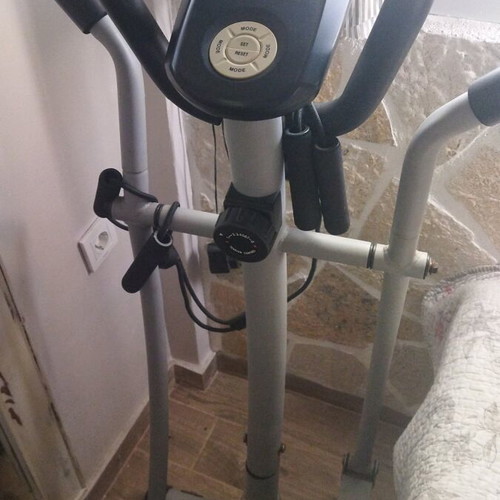 Elliptical machine used for full body fitness and exercise