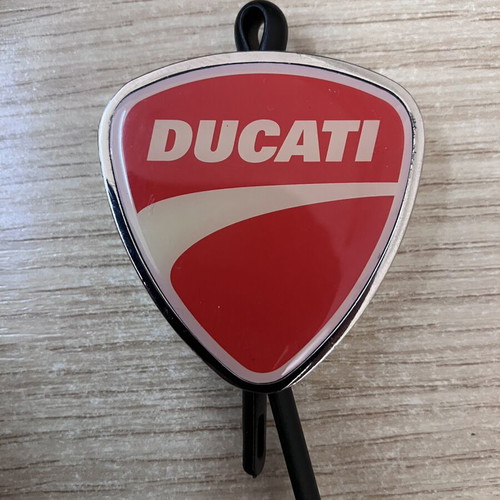 Ducati Official metal keychain with red and white enamel shield design