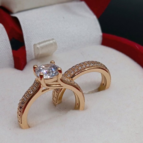 Set of solitaire ring and wedding band plated new with zircon