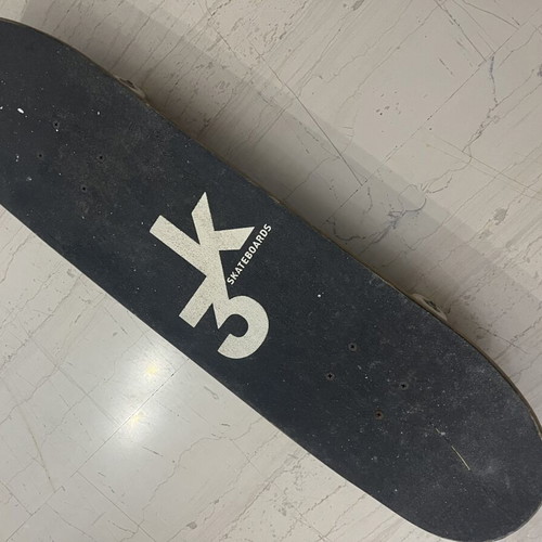 Skateboard used with satellite design on bottom