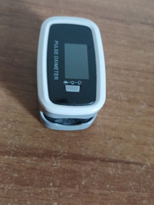 Pulse oximeter finger used, missing back cover