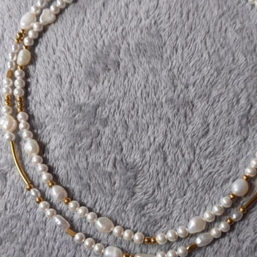 Steel necklace set like new, white and gold details
