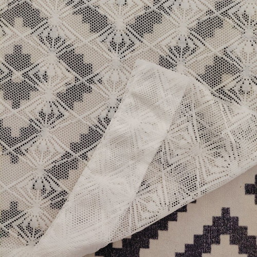 Two sewn white lace curtains, 2.5m height, 1.5m width each