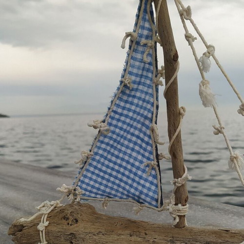 Decorative handmade boat new with driftwood