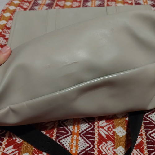 Rains backpack used, gray color, small inner pocket