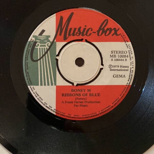 Set of 4 used 45 rpm vinyl records, pop genre