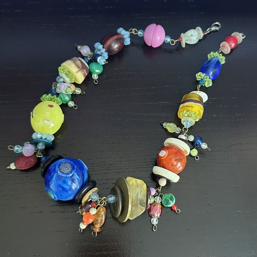 Handmade necklace with colorful beads and unique elements new