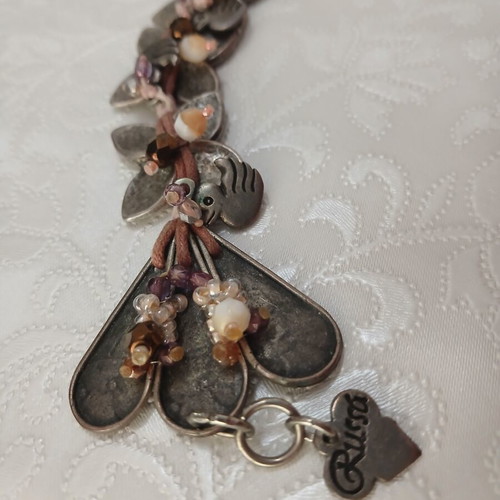 Russa handmade bracelet like new with floral and duck design