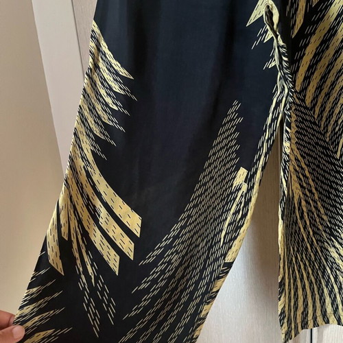 Set palazzo pants and asymmetric top used, size S-M