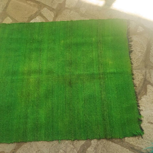 Woven green loom rug like new