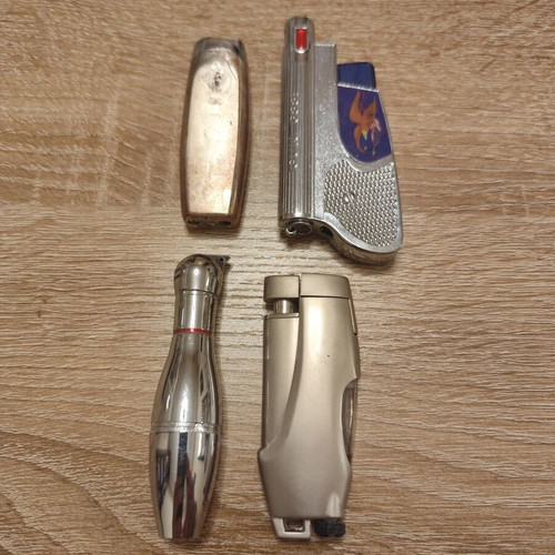 Collection of 25 used vintage lighters and 3 matchboxes from hotels and restaurants