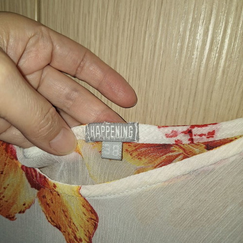 Happening women's blouse like new, size 38, white multicolor