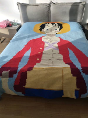 Handmade knitted blanket made to order featuring Luffy from One Piece