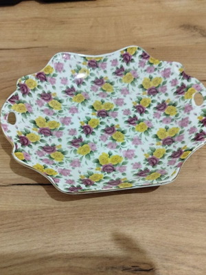 Ceramic platter used with floral decoration