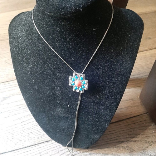 Cross necklace with stones used
