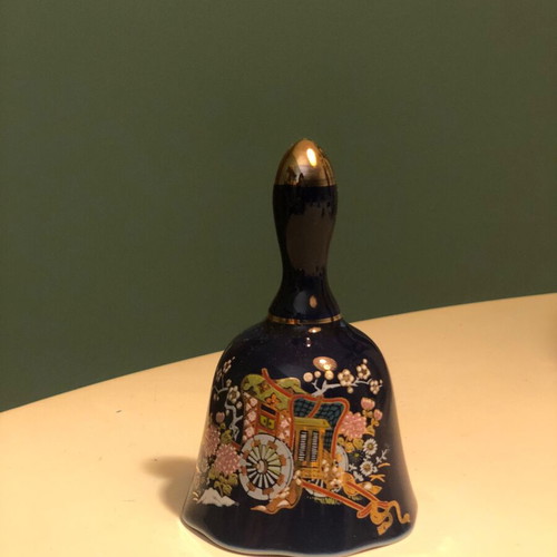 Porcelain bell with hand-painted design like new