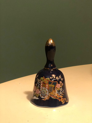 Porcelain bell with hand-painted design like new