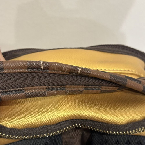 Sprayground That Gold Drip DLXSV Backpack new, black and brown checkered with gold design