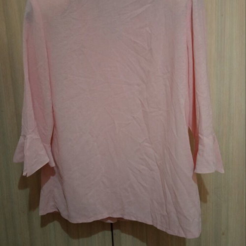 Women's pastel pink shirt like new with bell sleeves and ruffles
