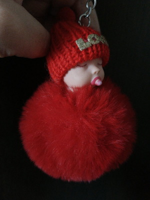 Keychain baby with red pompom new