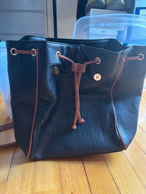 Backpack bag like new, black and brown with magnetic buttons