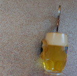 Decorative bottle opener used with wear around the magnet