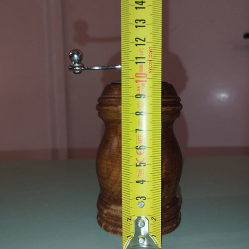 Vintage wooden spice grinder used