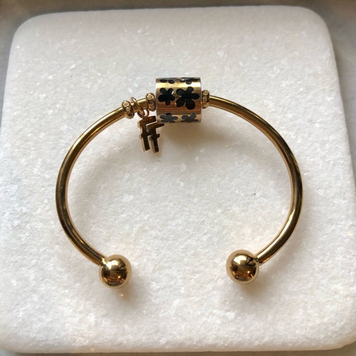 Folli Follie gold bracelet bangle with black enamel charm like new