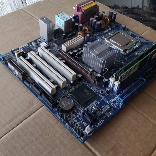 ASRock 775i65G motherboard with Intel Core2Duo E4500 CPU, fan and 2GB RAM like new