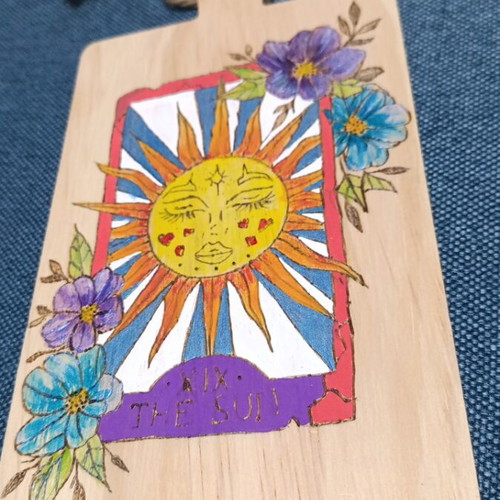 Pyrography and painting on cutting board like new
