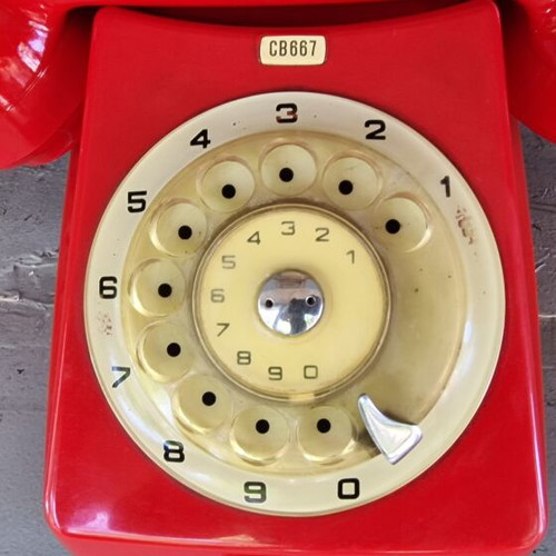 Vintage telephone from 1970s like new, red, wired