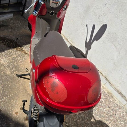 Red electric scooter for repair or spare parts