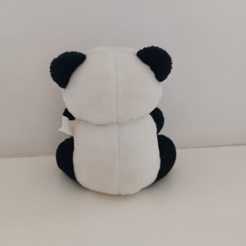 Plush panda with red bow tie