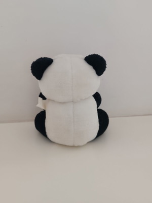Λούτρινο panda με κόκκινο παπιγιόν