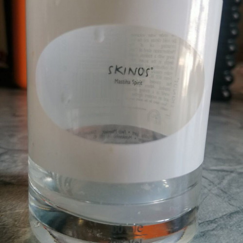 Decorative empty Skinos mastiha bottle used