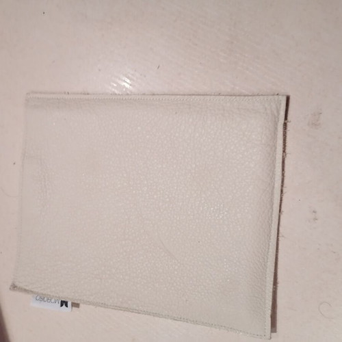 Leather document holder with scratches