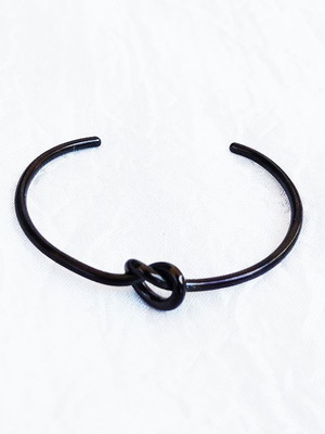 Tumi stainless steel knot bracelet black, like new