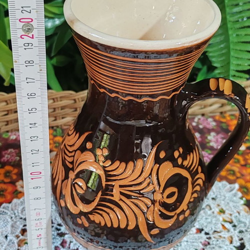 Vintage pottery jug with floral sgraffito decoration, 22 cm