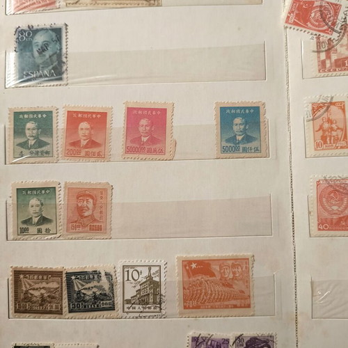 Stamp album like new with about 500 mostly foreign stamps