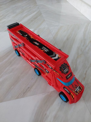 Car transport truck used with launcher